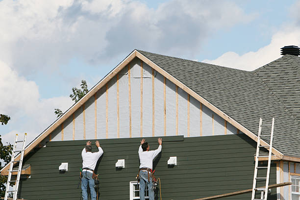 Professional Siding Installation technician working in Dallas, OR